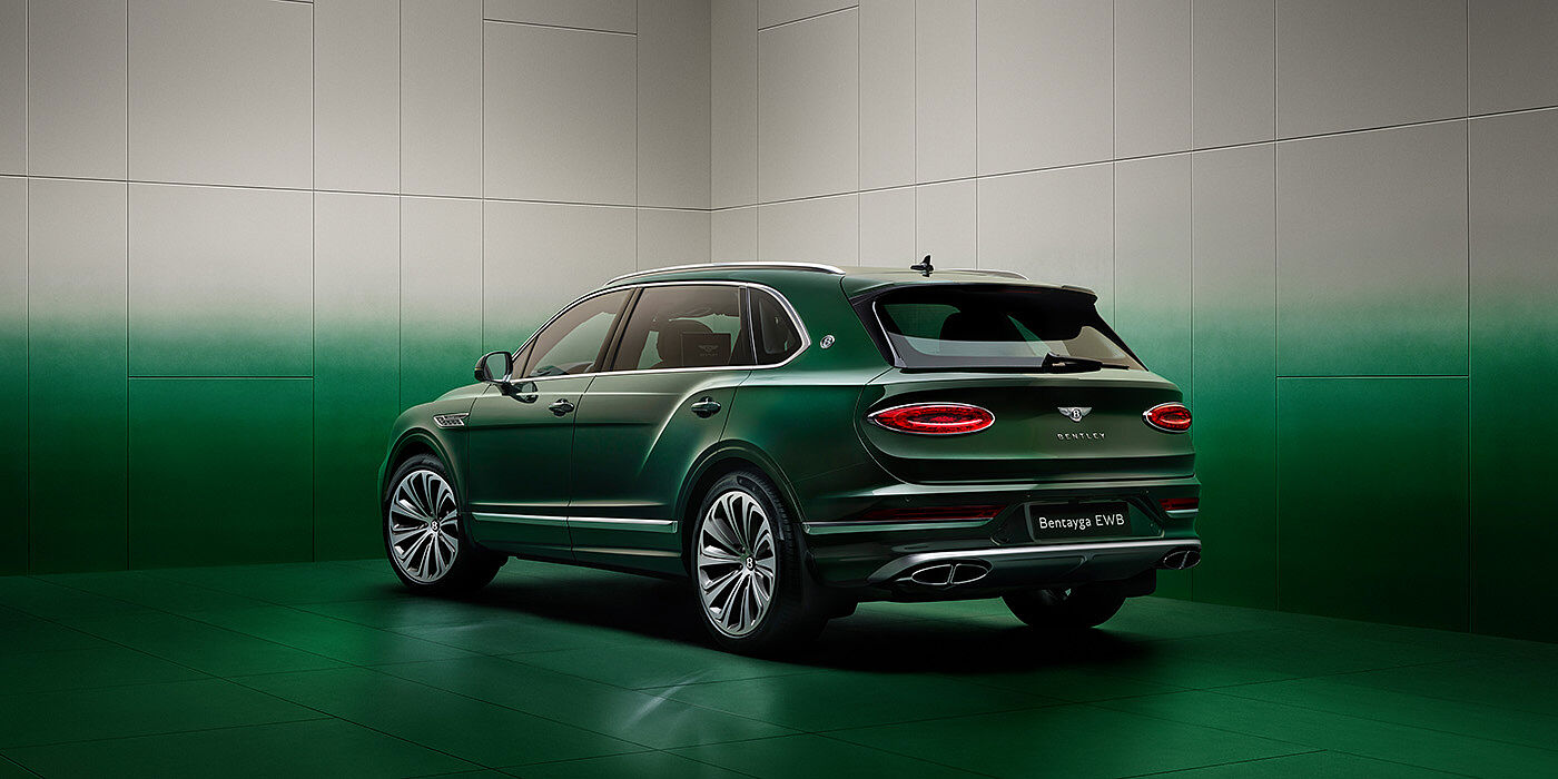Bentley Almaty Bentley Bentayga Extended Wheelbase SUV Rear three quarter view in Light Emerald green paint in green and grey room
