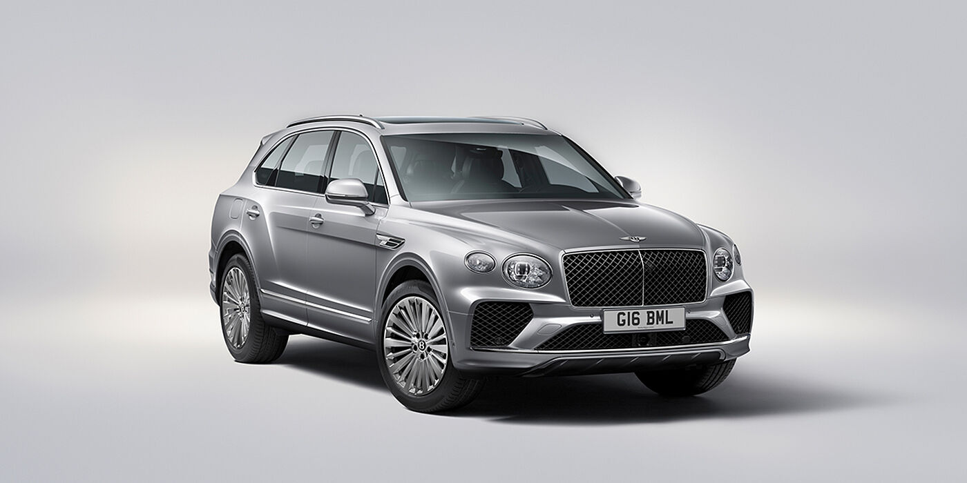 Bentley Almaty Bentley Bentayga luxury SUV front three quarter view in Moonbeam paint with matrix grille and 21″ 5 spoke painted wheels