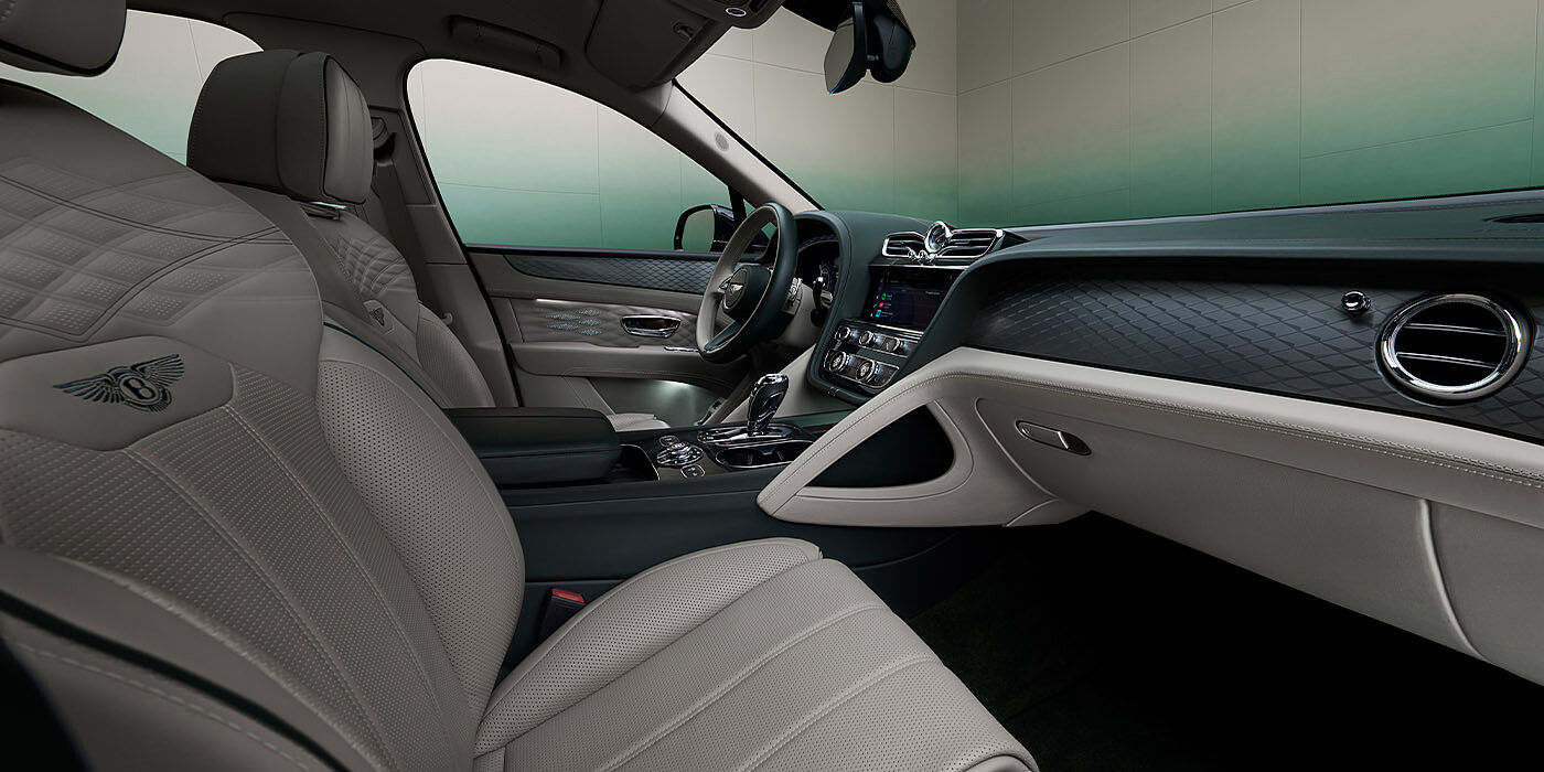 Bentley Almaty Bentley Bentayga Extended Wheelbase Atelier Edition SUV front interior in Portland and Cumbrian Green hides with Dark Tint Diamond Brushed Aluminium veneer