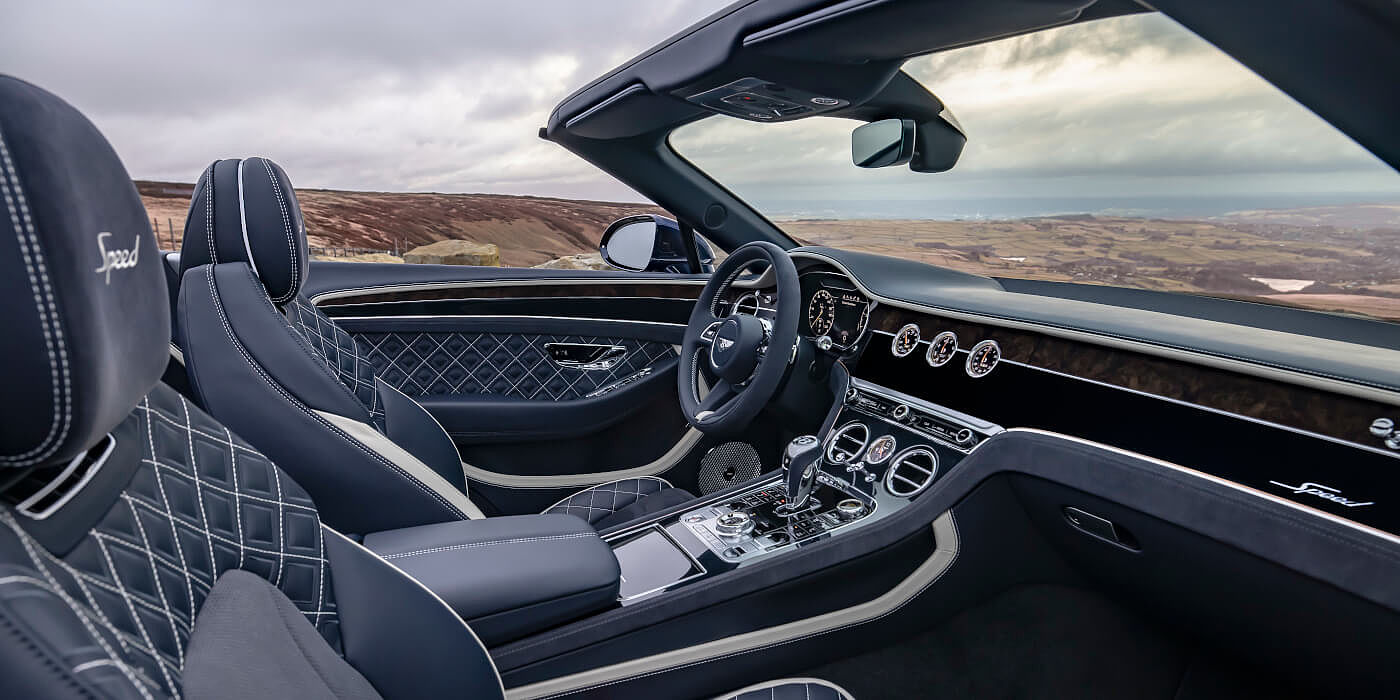 <new-bentley-continental-gt-speed-convertible-front-cabin-imperial-blue-and-linen-hide-in-peak-district> 